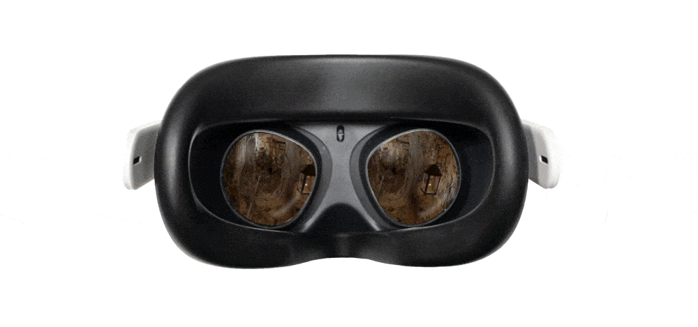 Image of a virtual reality headset with a cave visible through the lenses