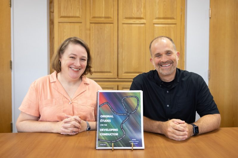 (From left) Anita Walz, assistant director of open education and scholarly communication librarian, and Derek Shapiro, director of bands and assistant professor of music. 
