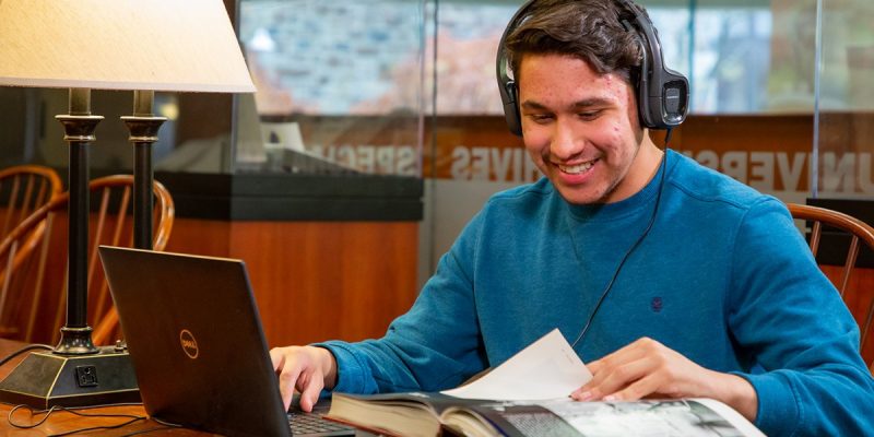 Student worker transcribes materials in Special Collections and University Archives